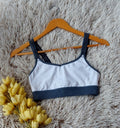 TOP BLANCO ELASTICO GRIS CON TRANSPARENCIA EN TIRANTES