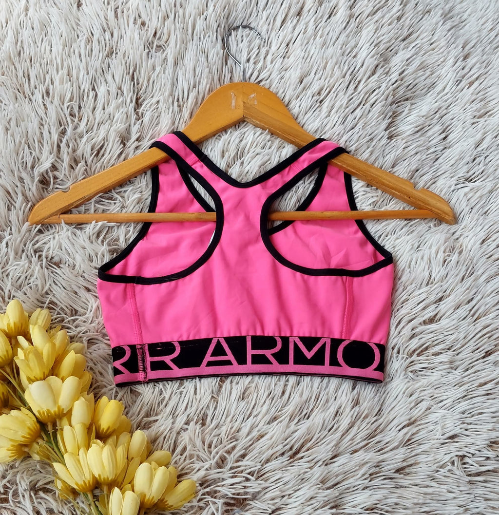 TOP ROSA CON ELASTICO NEGRO Y MARCA EN CINTURA